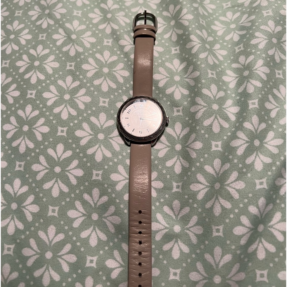 Kate spade gray leather watch.  Battery works. Comes with Kate spade watch box